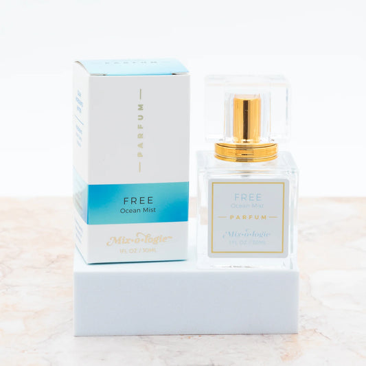 Mixologie Free Ocean Mist scent parfum/perfume in a square glass bottle with a gold spray top