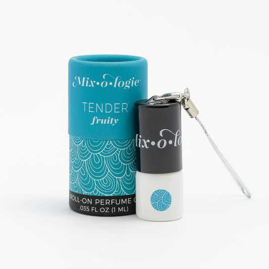 A Mixologie brand keychain mini rollerball perfume in a fruity scent, with a turquoise label featuring text and a keychain attached.