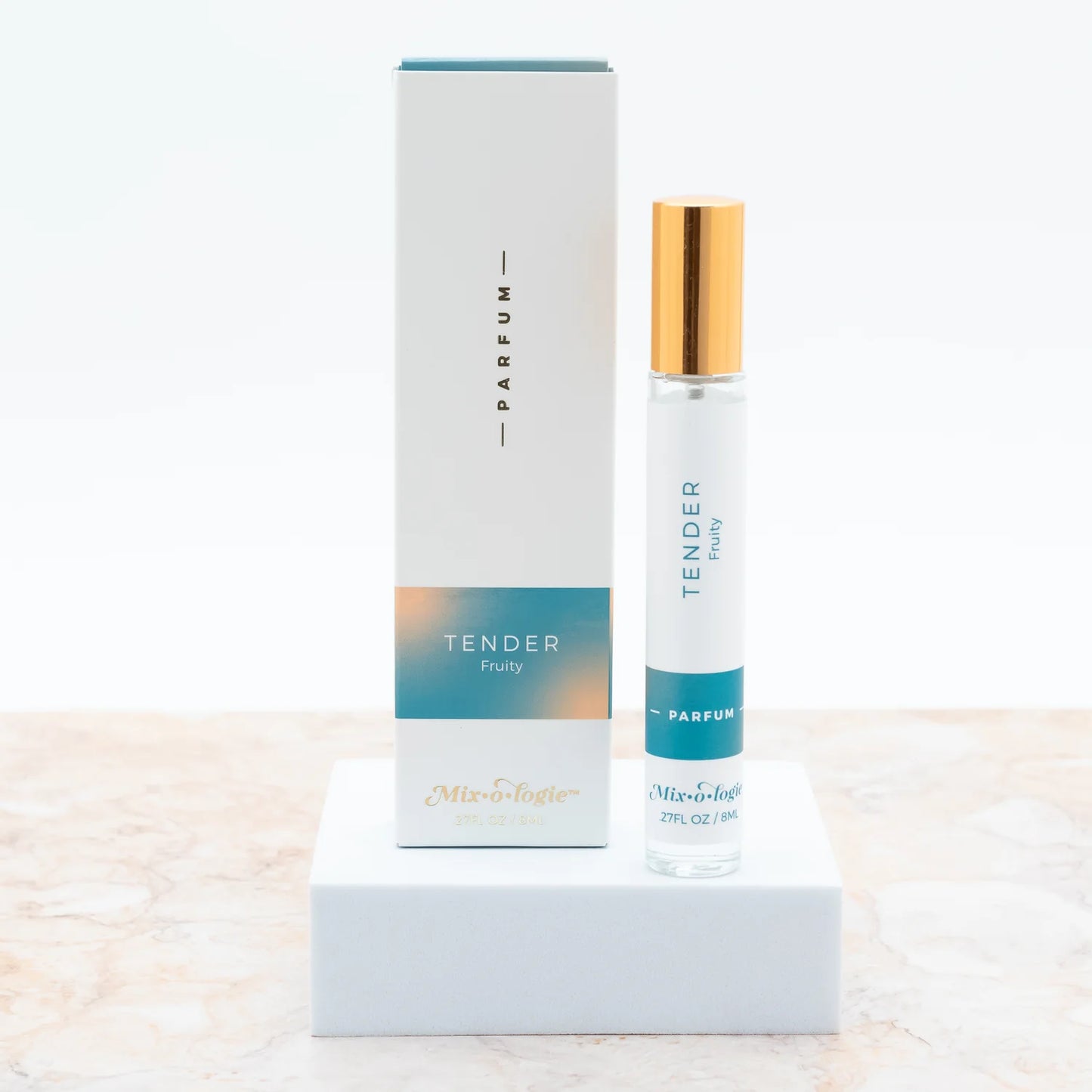 Mixologie Tender a fruity scent parfum/perfume spray in a clear glass bottle with a gold cap.