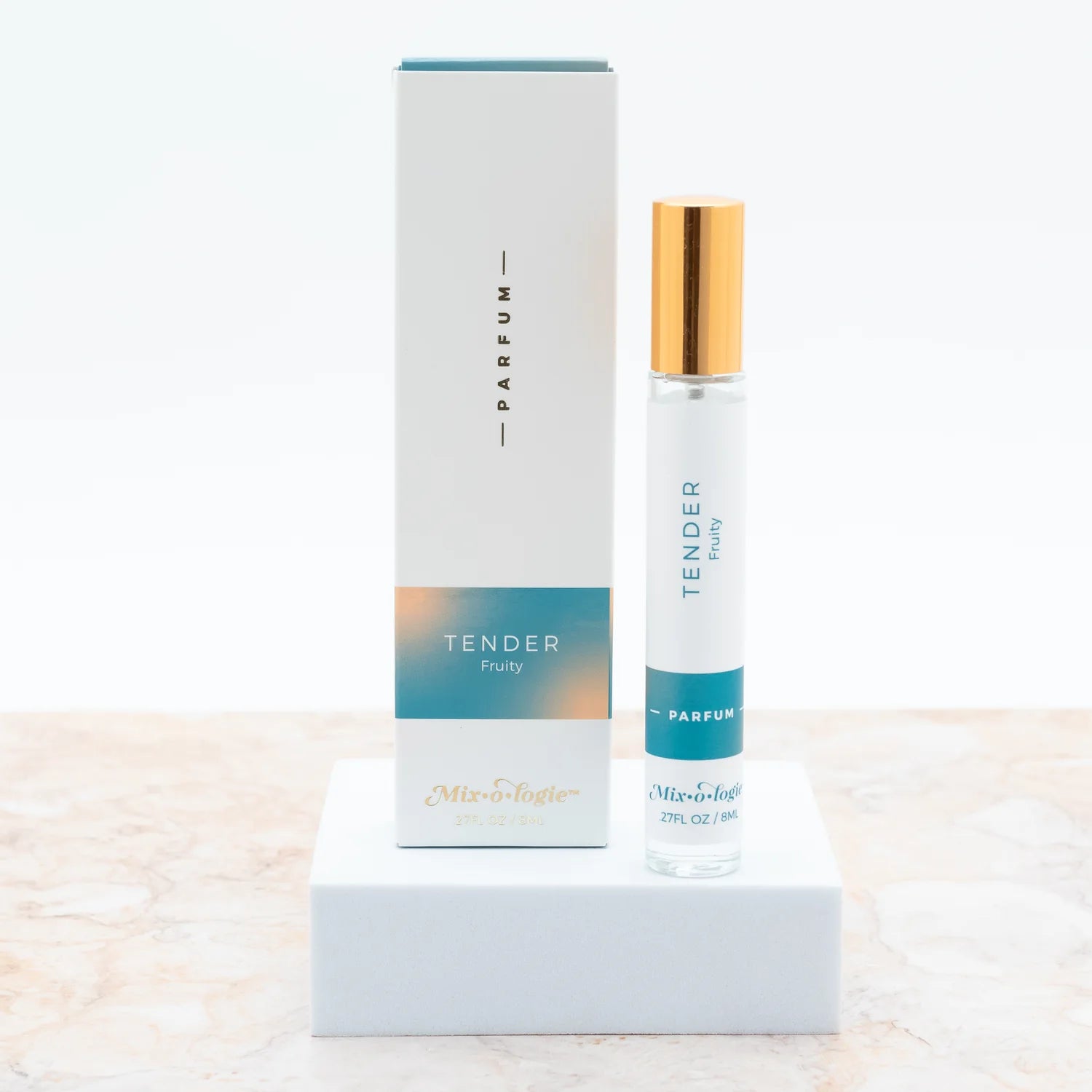 Mixologie Tender a fruity scent parfum/perfume spray in a clear glass bottle with a gold cap.