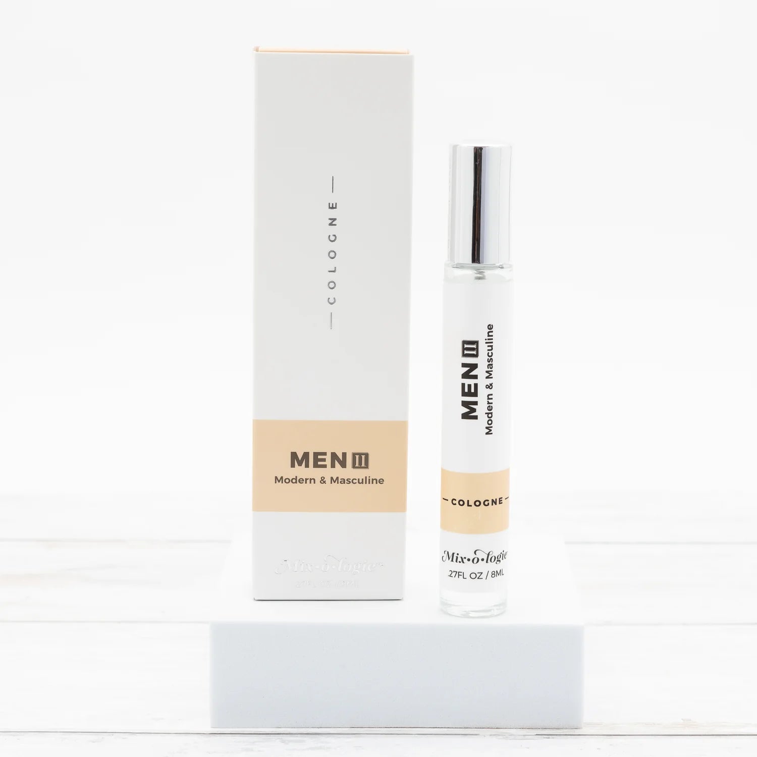 Men's cologne bottle and packaging on a white background