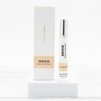 Men's cologne bottle and packaging on a white background