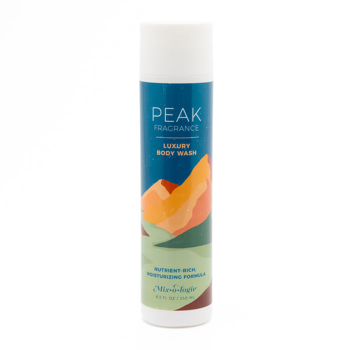 Peak Fragrance Luxury Body Wash bottle with colorful mountain design on the label, featuring a blue top section and green base.8.3 Fl Oz / 250 ML