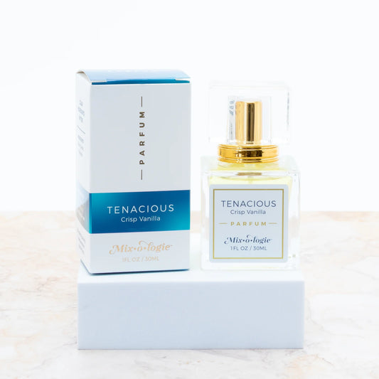 Mixologie Tenacious a crisp vanilla scent  parfum/perfume in a square glass bottle with a gold spray top