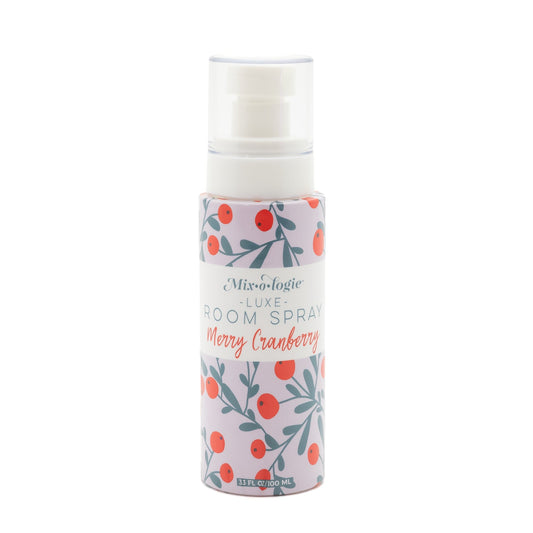 Room spray bottle with floral label on a white background