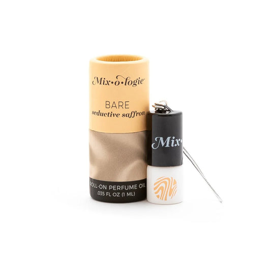 A keychain mini rollerball perfume bottle with the label 'Mixologie BARE seductive saffron' next to its cap, displayed against a white background.