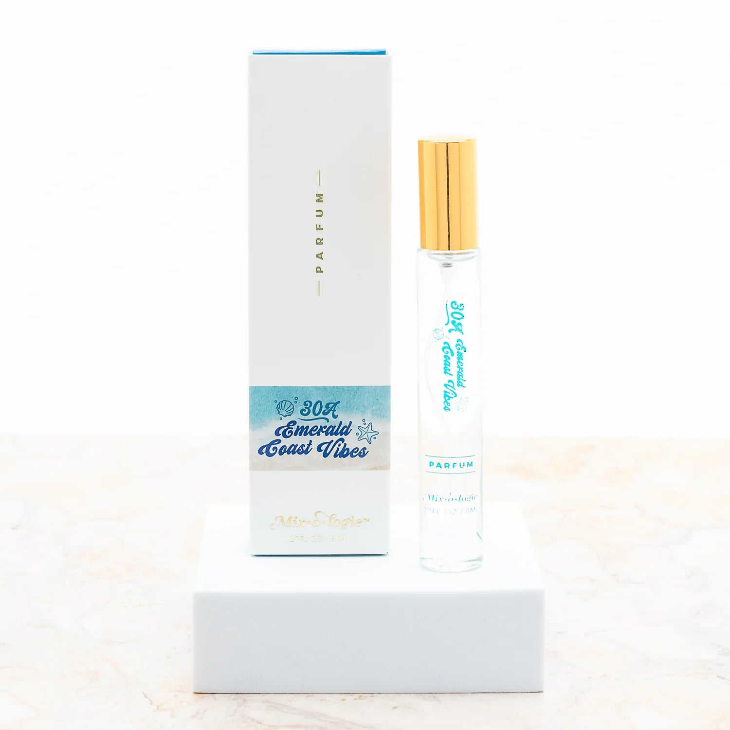 Mixologie 30A Emerald Coast Vibes perfume / parfum spray  in a clear glass bottle with a gold cap