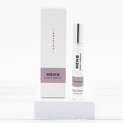 Men's cologne bottle and packaging on a white background