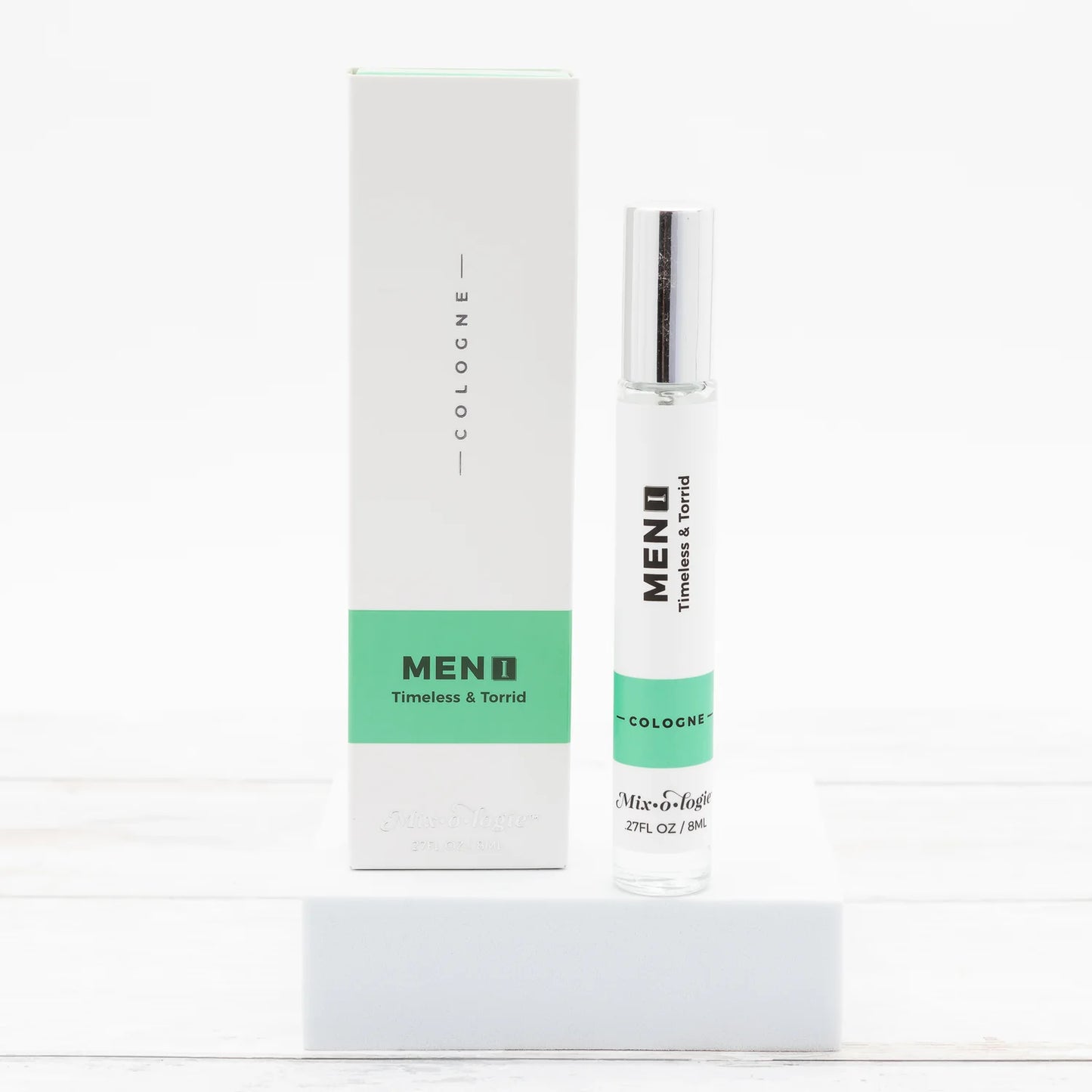 Mixologie Men’s 1 in Timeless & Torrid scent cologne spray in a clear glass bottle with a silver cap