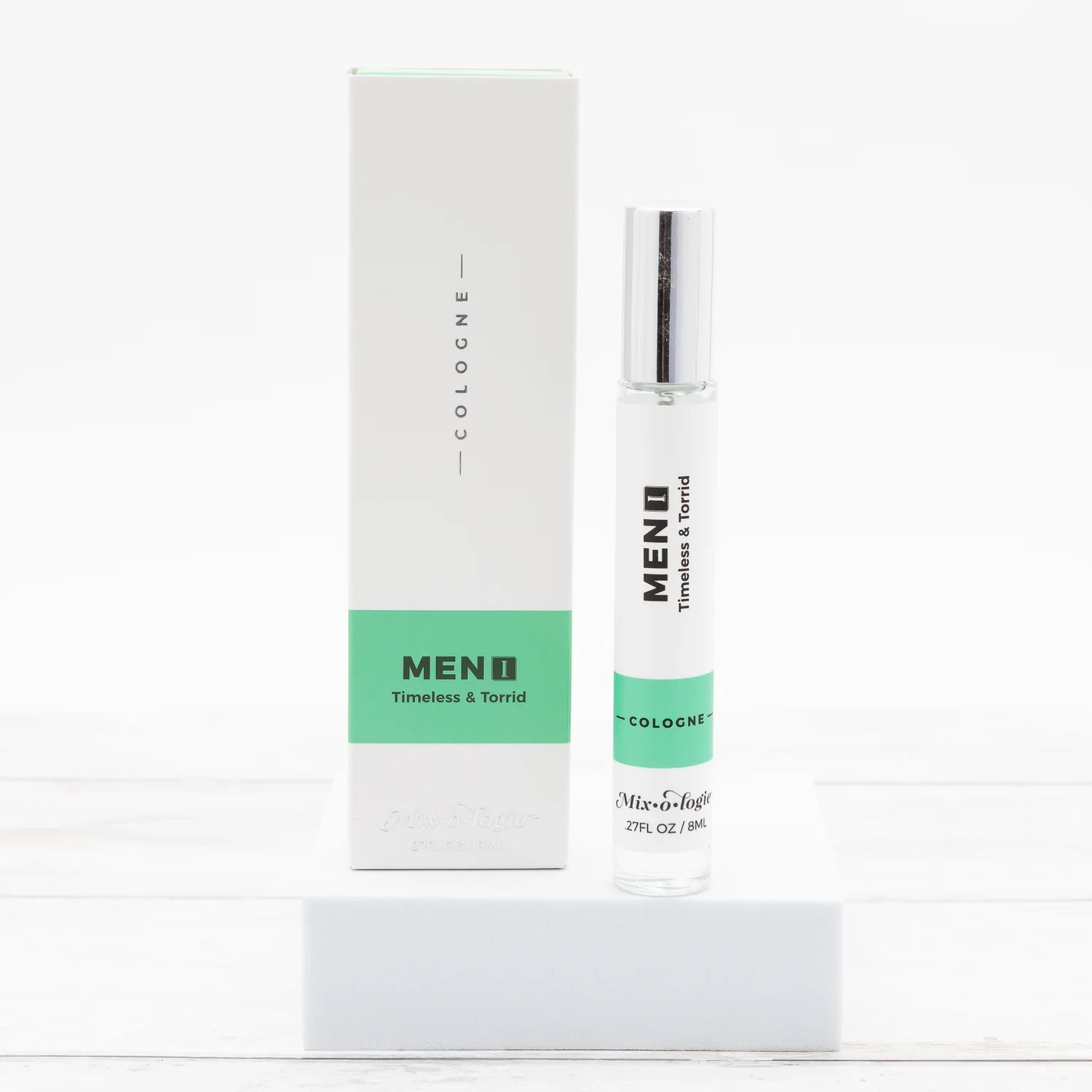 Mixologie Men’s 1 in Timeless & Torrid scent cologne spray in a clear glass bottle with a silver cap