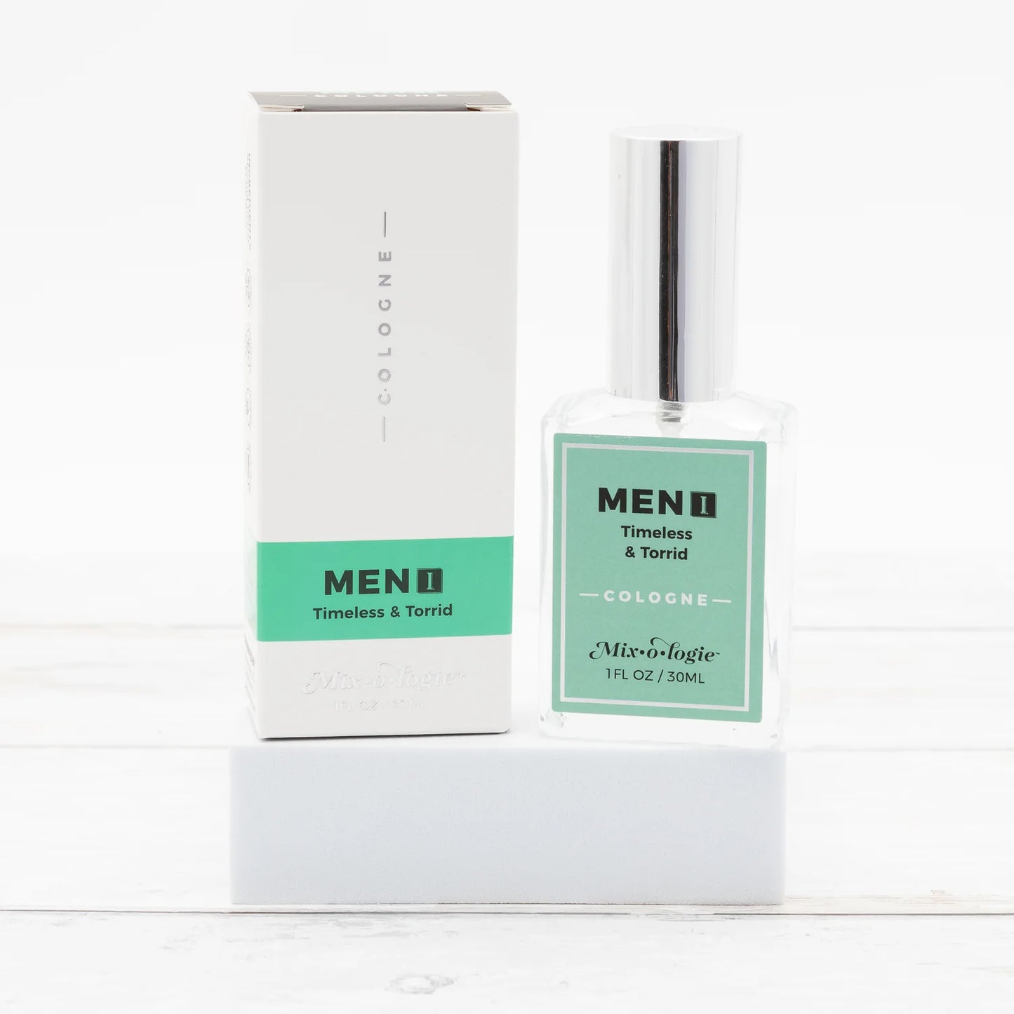 Mixologie Men’s 1 in Timeless & Torrid scent cologne in a clear glass bottle with a silver cap