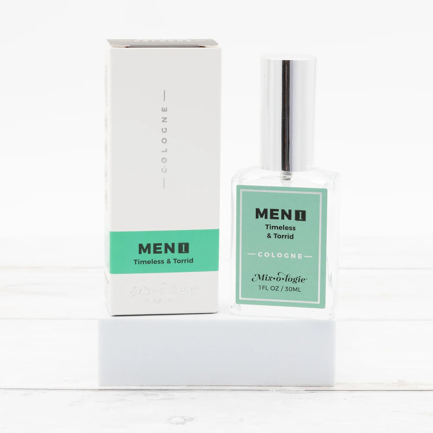 Mixologie Men’s 1 in Timeless & Torrid scent cologne in a clear glass bottle with a silver cap