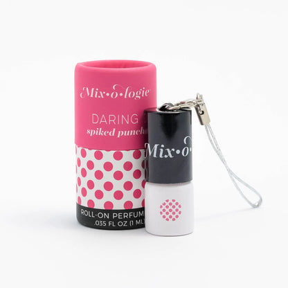 A pink and white keychain mini rollerball perfume with the brand 'MIXOLOGIE' and the scent 'Daring Spiked Punch' displayed on the packaging.