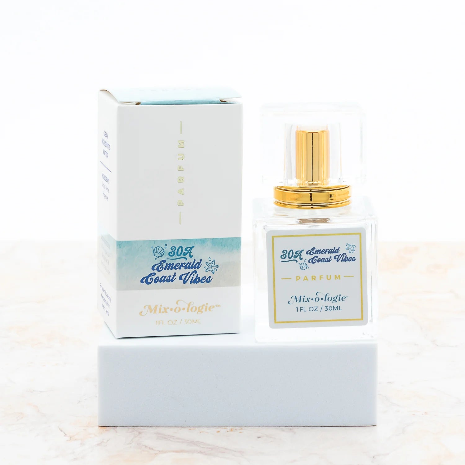 Mixologie 30A Emerald Coast Vibes perfume / parfum spray in a square glass bottle with a gold spray top