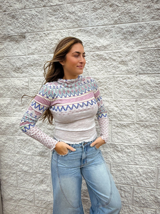 patterned ribbed long sleeve top with lettuce trim and hood. 