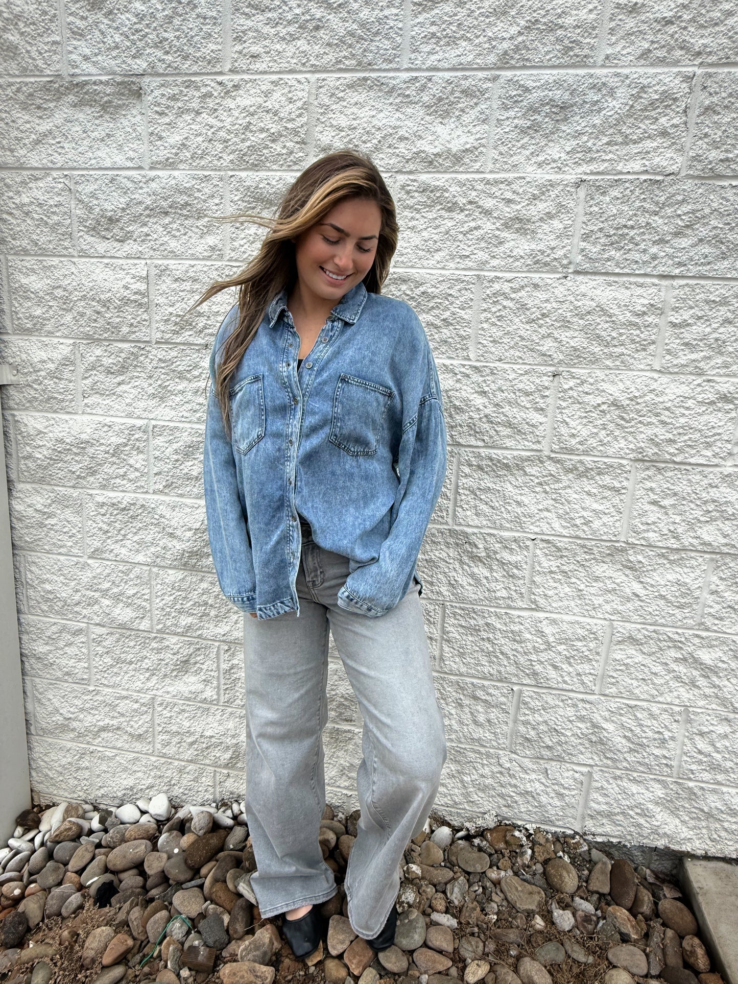 Chambray button down paired with gray stretch wide leg jeans 