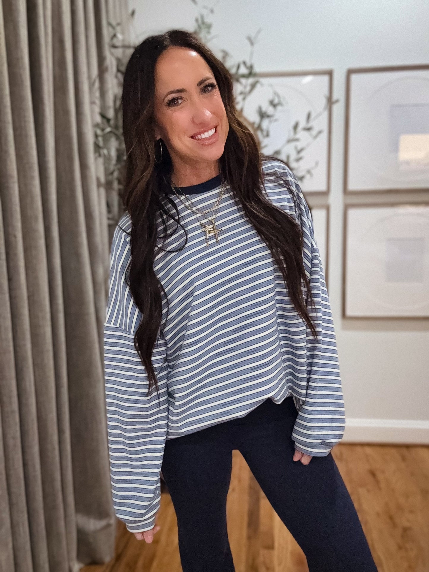Blue and white striped oversized long-sleeve pullover made from soft, cozy fabric