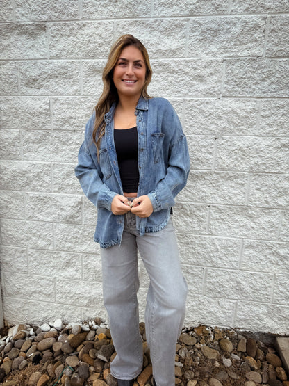 Chambray button down paired with gray stretch wide leg jeans 