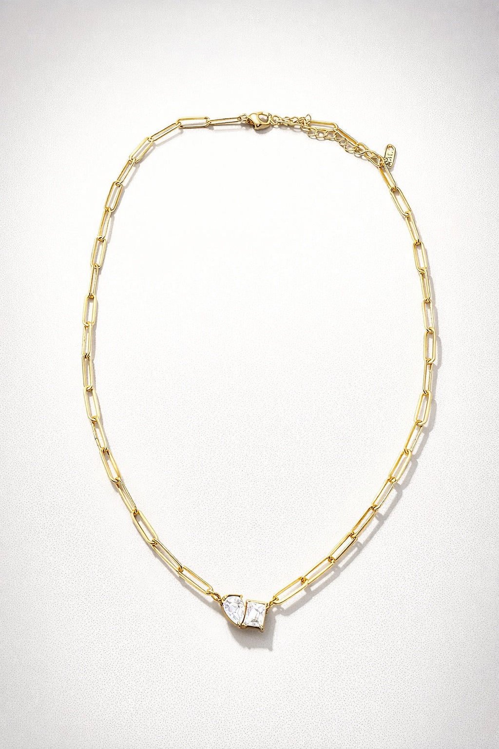 Bound Together diamond necklace with gold chain and dual stone pendant design