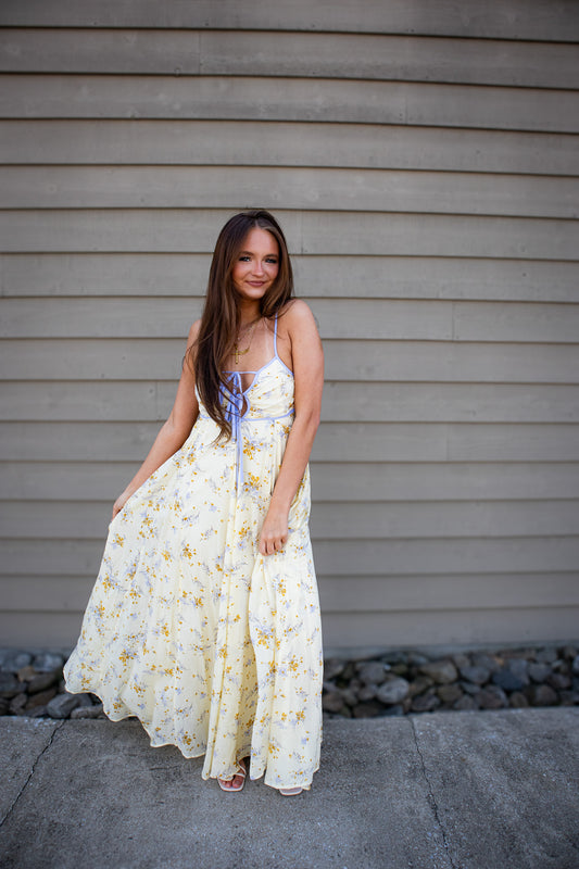 Radiate confidence in our Butter Yellow Blossom Maxi. 100% cotton, adjustable straps & a flattering fit. Perfect for spring brunches & vacations. Shop now!