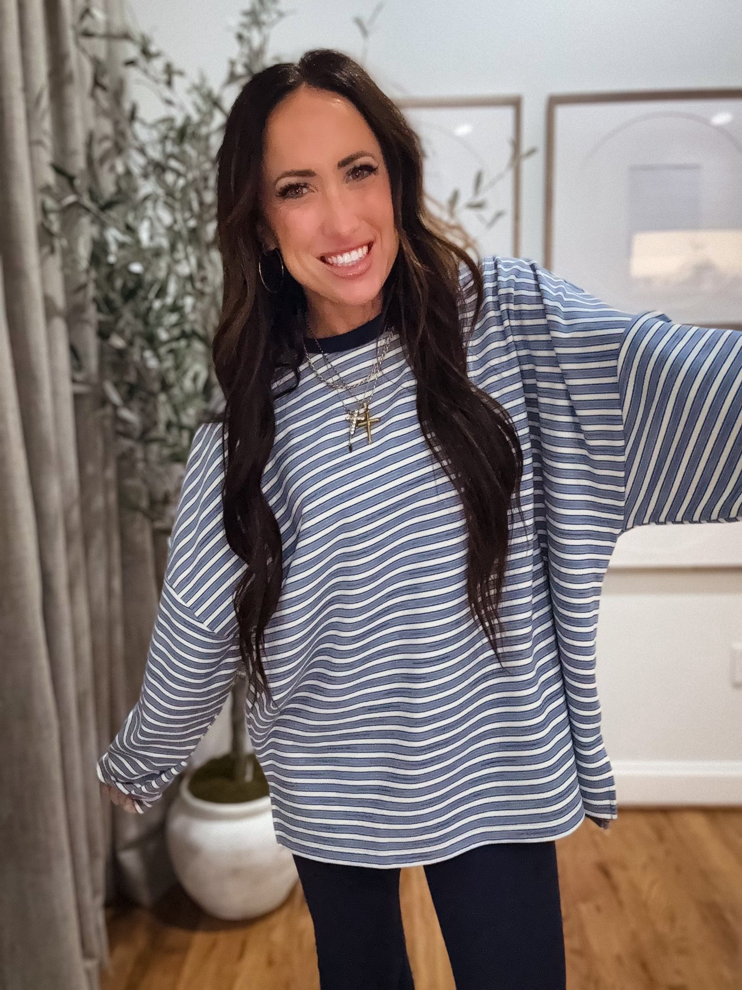 Blue and white striped oversized long-sleeve pullover made from soft, cozy fabric