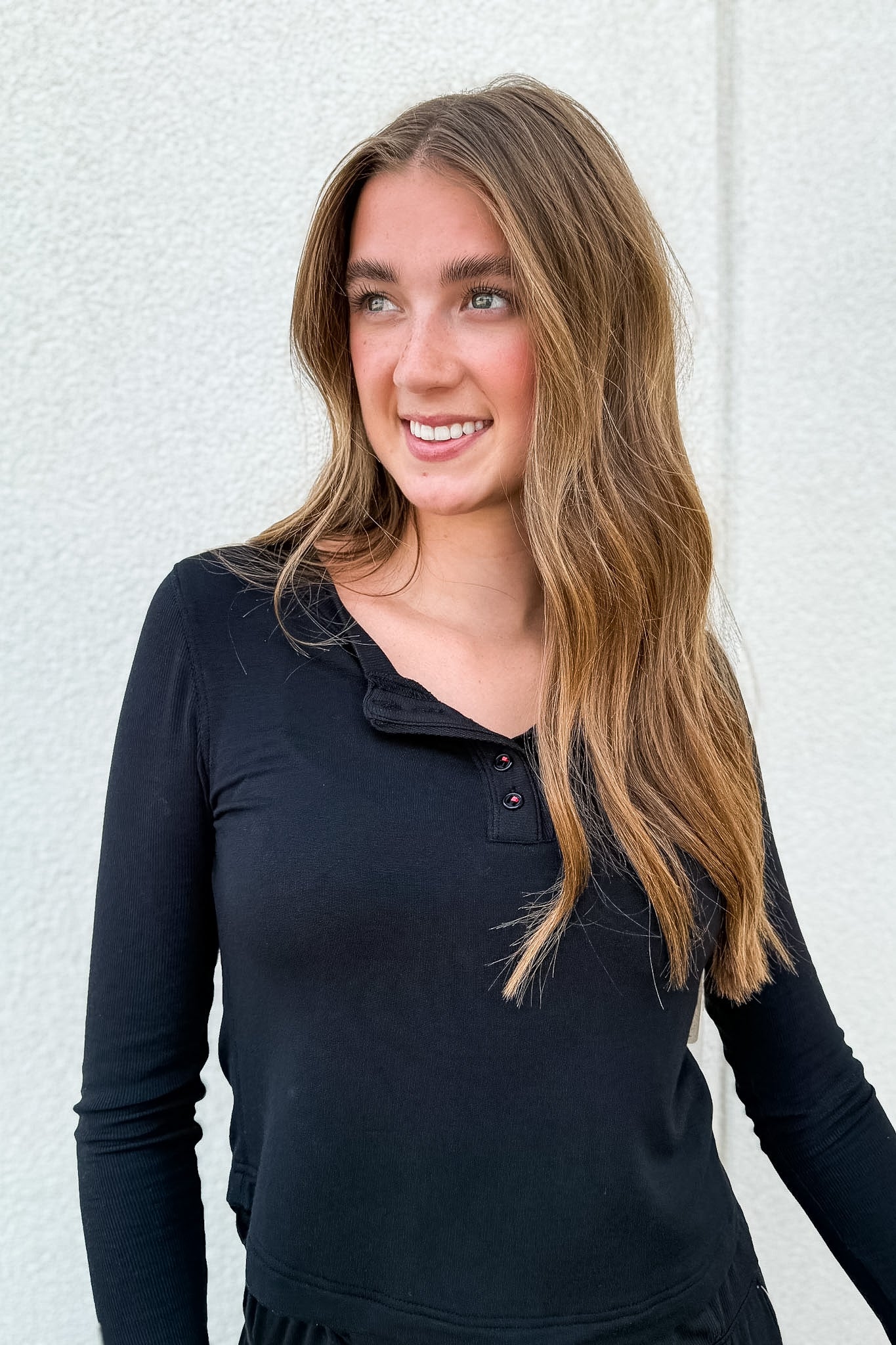 Shop the Dream State Cropped Henley Top. Made from buttery-soft modal with lettuce-trimmed sleeves, it’s the ultimate loungewear essential for everyday comfort.