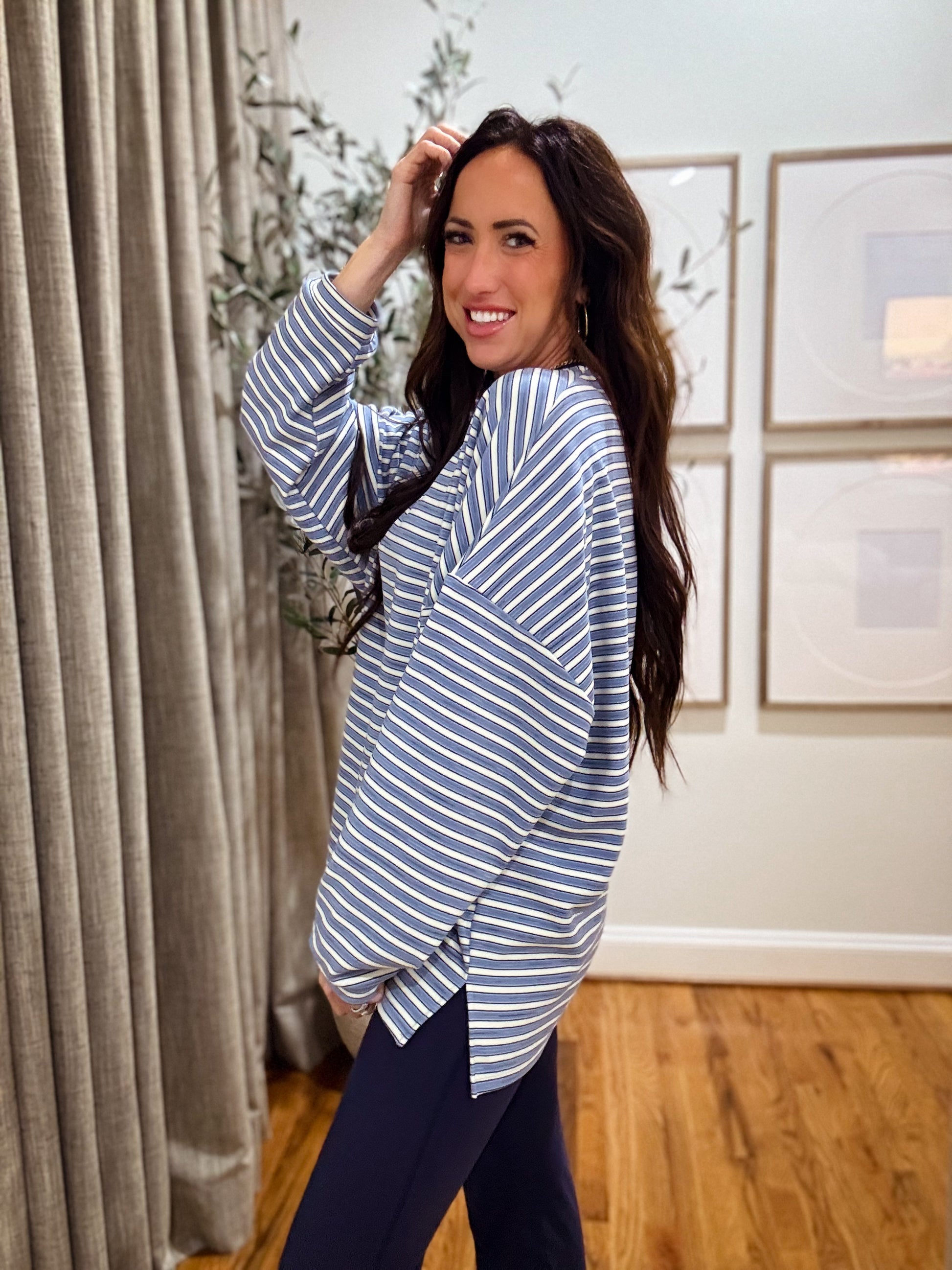 Blue and white striped oversized long-sleeve pullover made from soft, cozy fabric