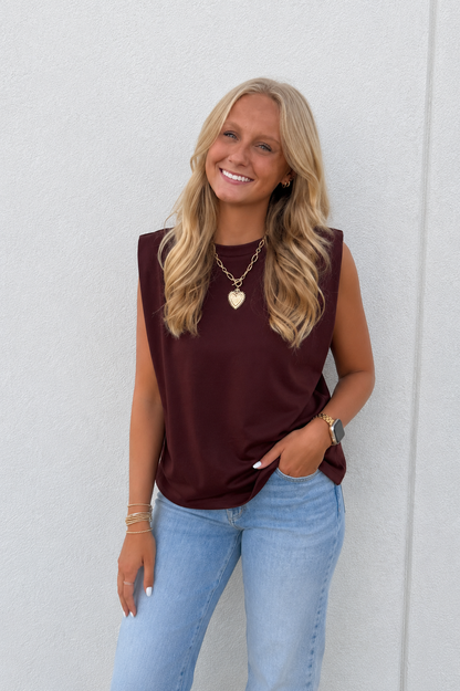 Elevate your style with the Espresso Hour Muscle Tank. Perfect color knit to make this the ultimate versatile closet staple. 