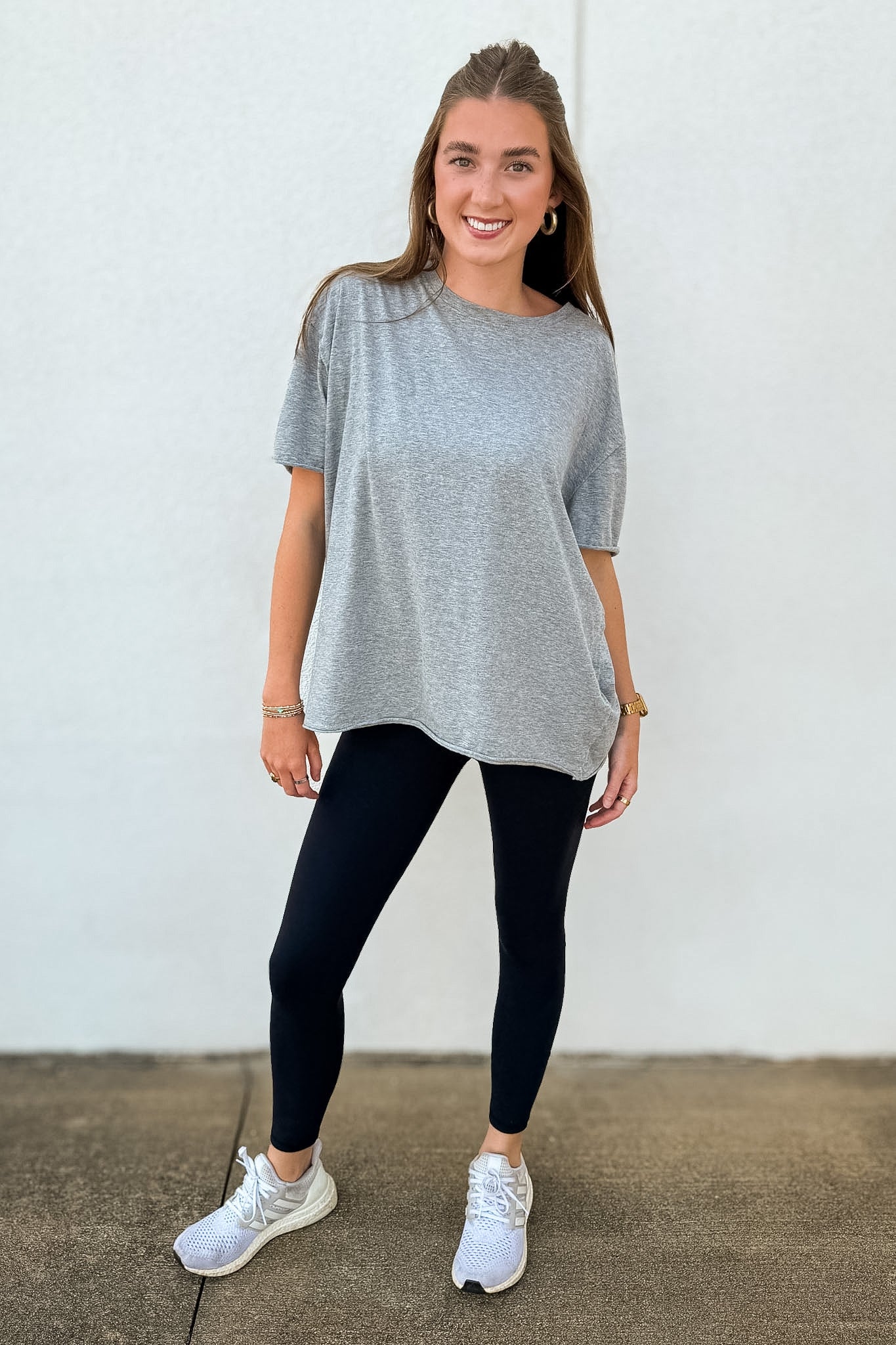 Elevate your wardrobe with the Free People Nina Tee. Featuring an oversized boxy fit & raw-edge seaming, this cozy cotton tee is your new favorite everyday staple.