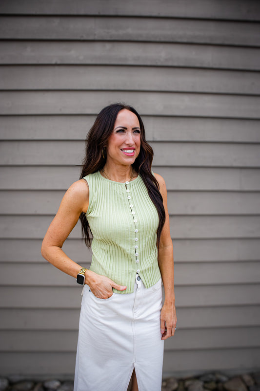 Shop the Free People Tilly Vest in Weeping Willow. A chic, ribbed button-front top perfect for layering or summer styling. Breathable cotton with a slim fit. 