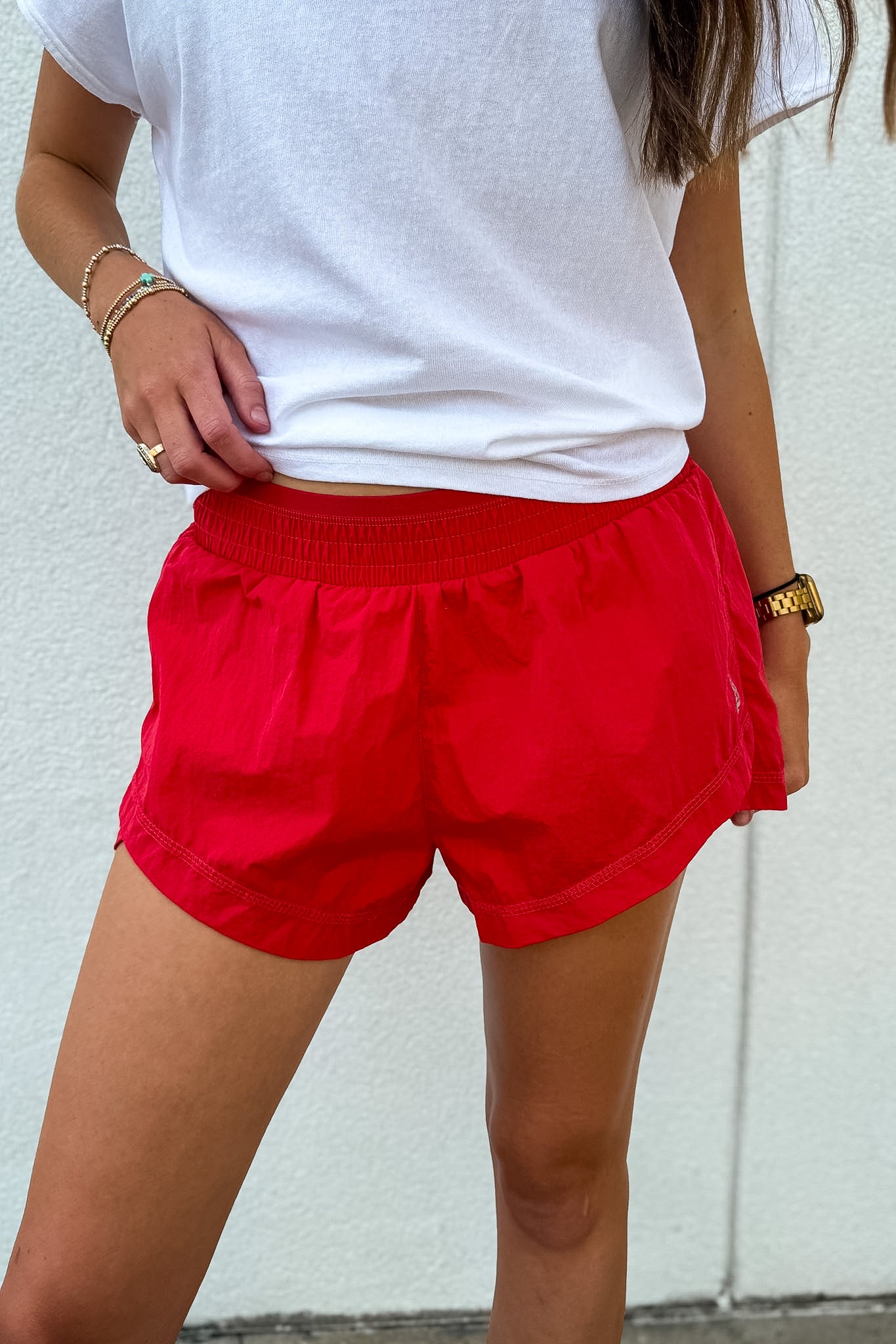 Shop Free People On The Go Run Shorts in Victory Red. Sweat-wicking, low-rise, and lightweight with built-in briefs—perfect for runs and lifestyle. Order yours now!