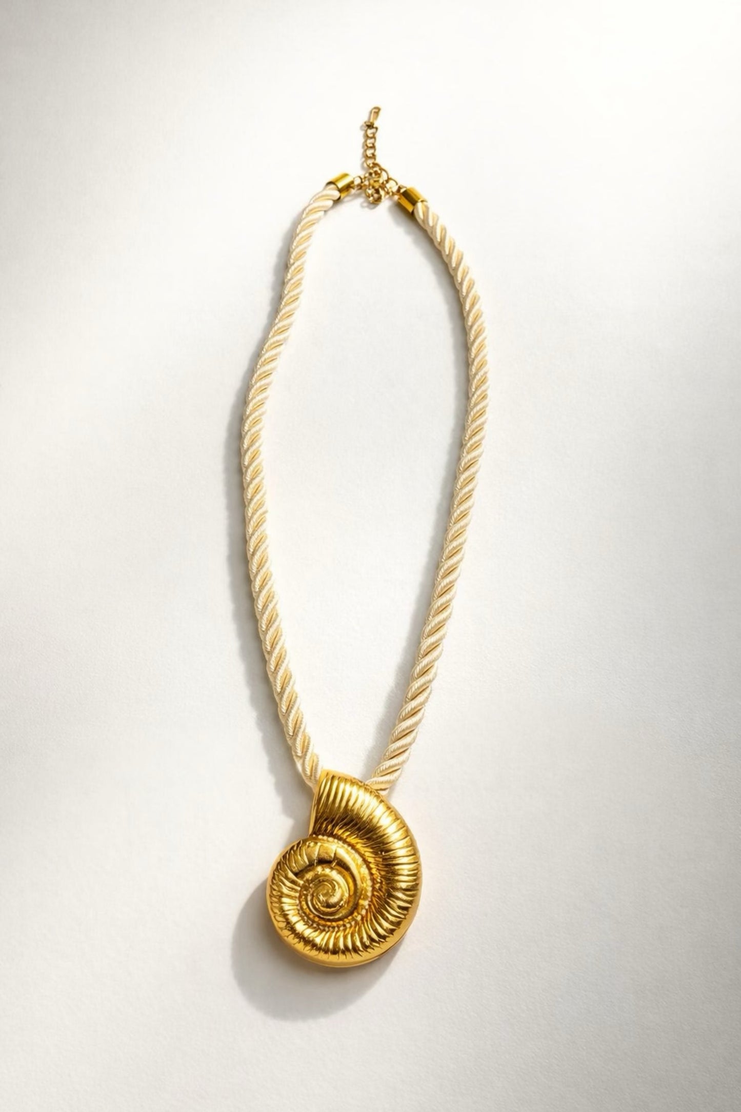 Glory In Creation shell rope necklace with gold rope chain and shell pendant, textured coastal style