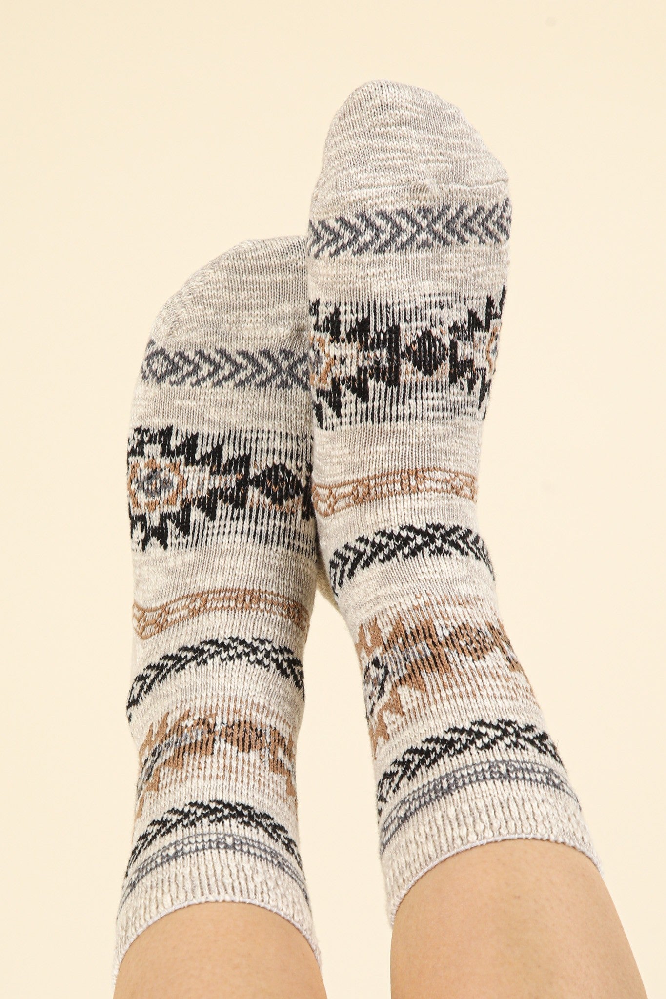 Patterned socks on a beige background