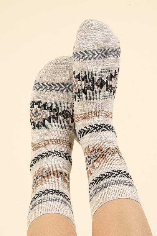 Patterned socks on a beige background