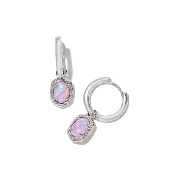 A pair of silver huggie hoop earrings with dangling shield-shaped opal gemstones, shown on a clean white background.