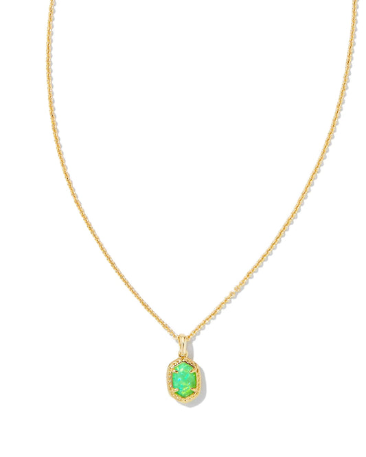 Gold necklace with a green pendant on a white background