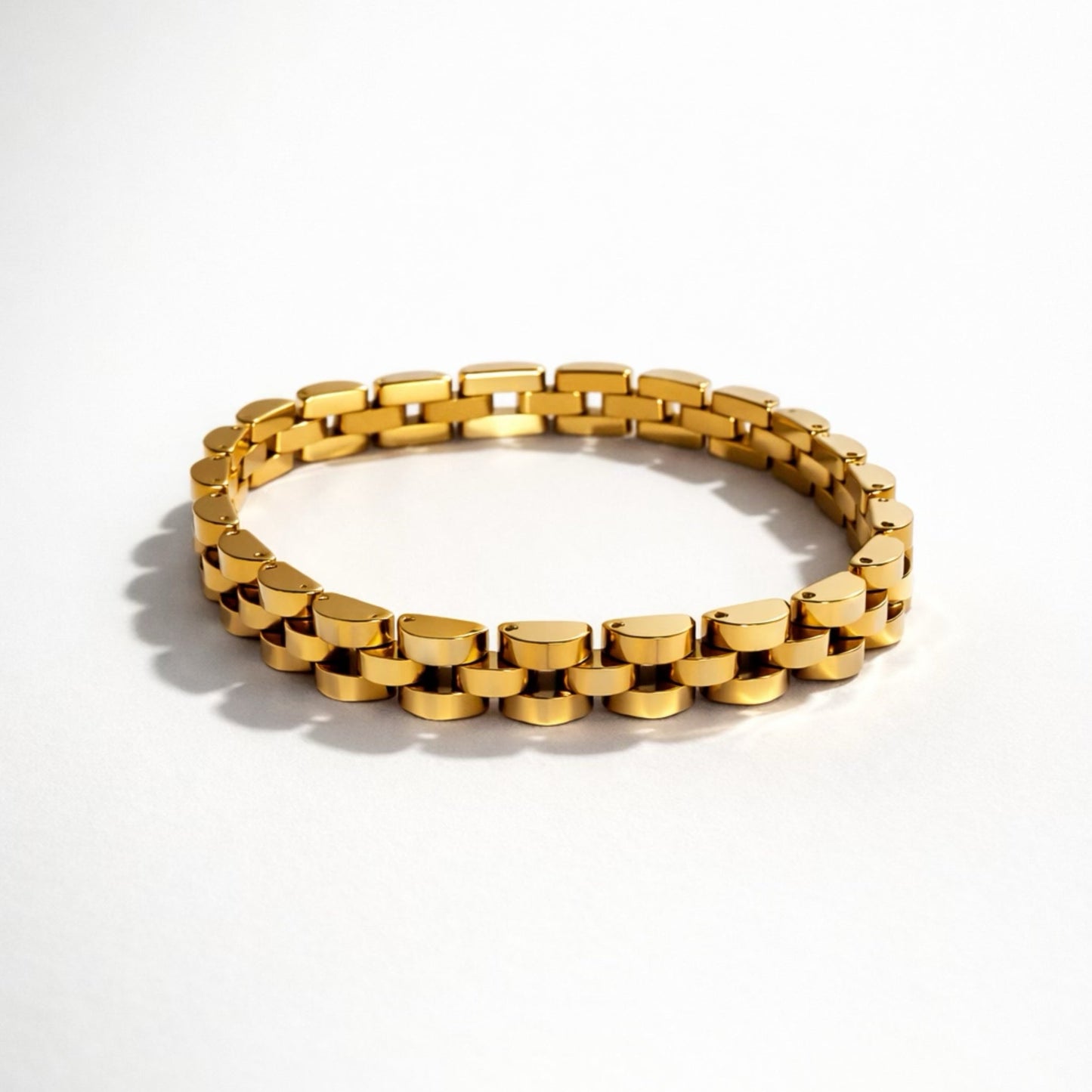Trendy gold bracelet with chunky link design and polished finish