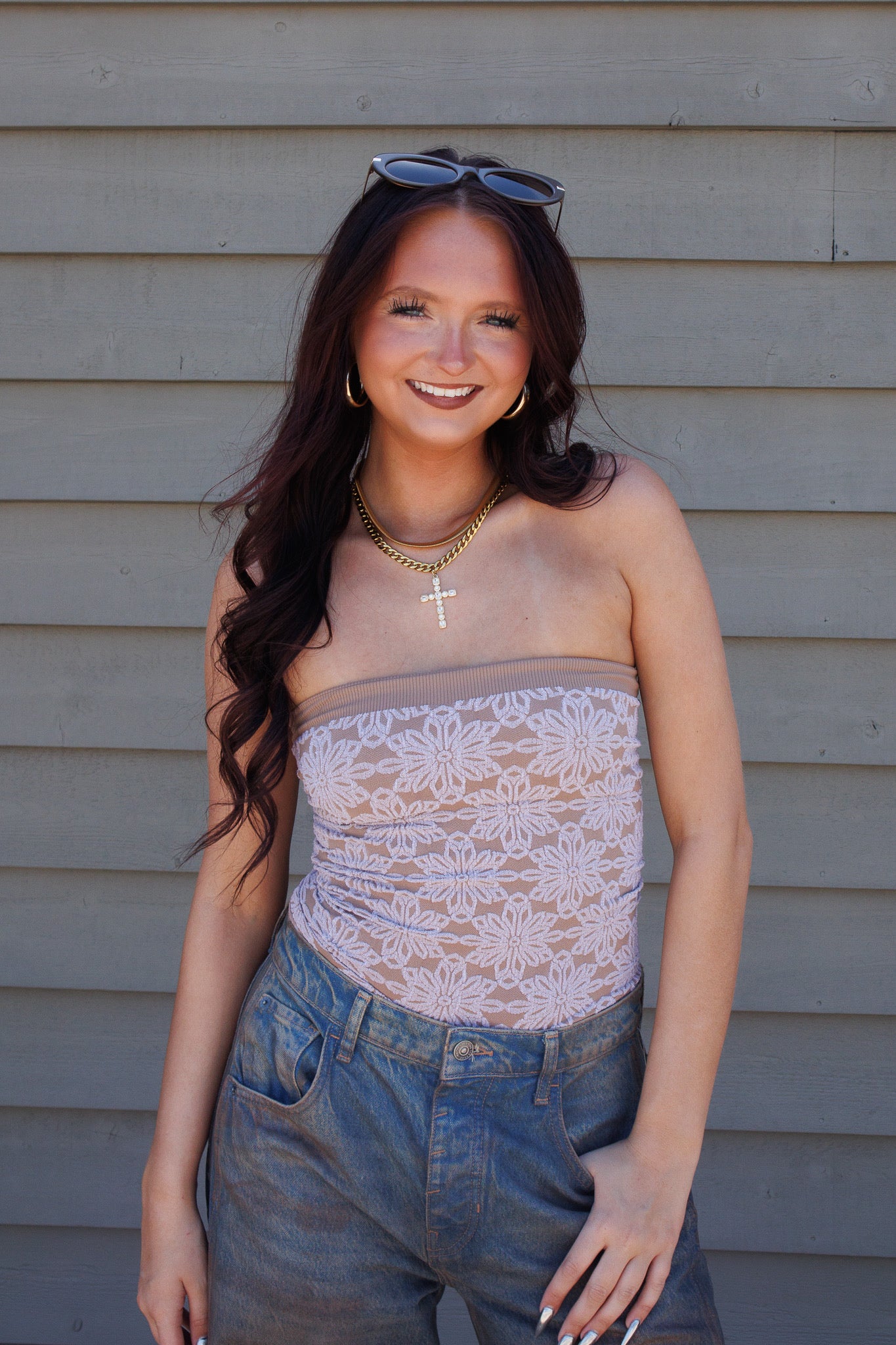 Elevate your summer wardrobe with this high-end designer-inspired floral tube top. Featuring an ultra-stretchy taupe knit and a flattering strapless fit, it’s the ultimate outfit-maker for concerts, vacations, and sun-soaked days.