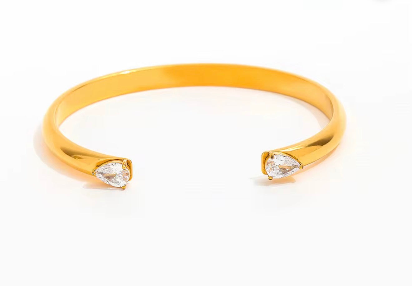 Trendy Ruth diamond open cuff bracelet with gold band and crystal accents, minimalist elegant design