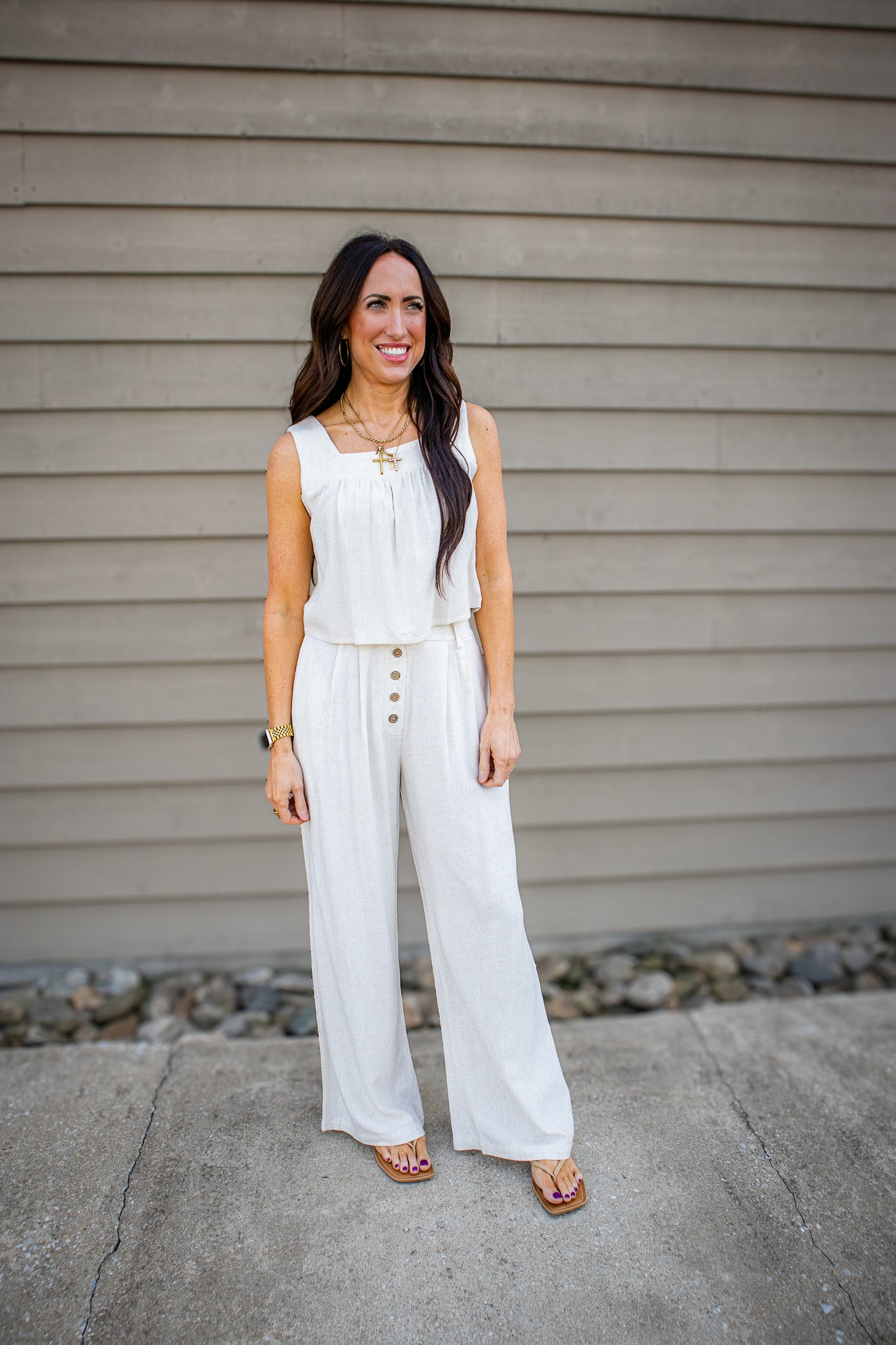 Look effortlessly put together in our Sands High-Rise Linen Pants. Featuring a wide-leg fit, button details, and pockets. Shop breathable, laid-back luxe now!