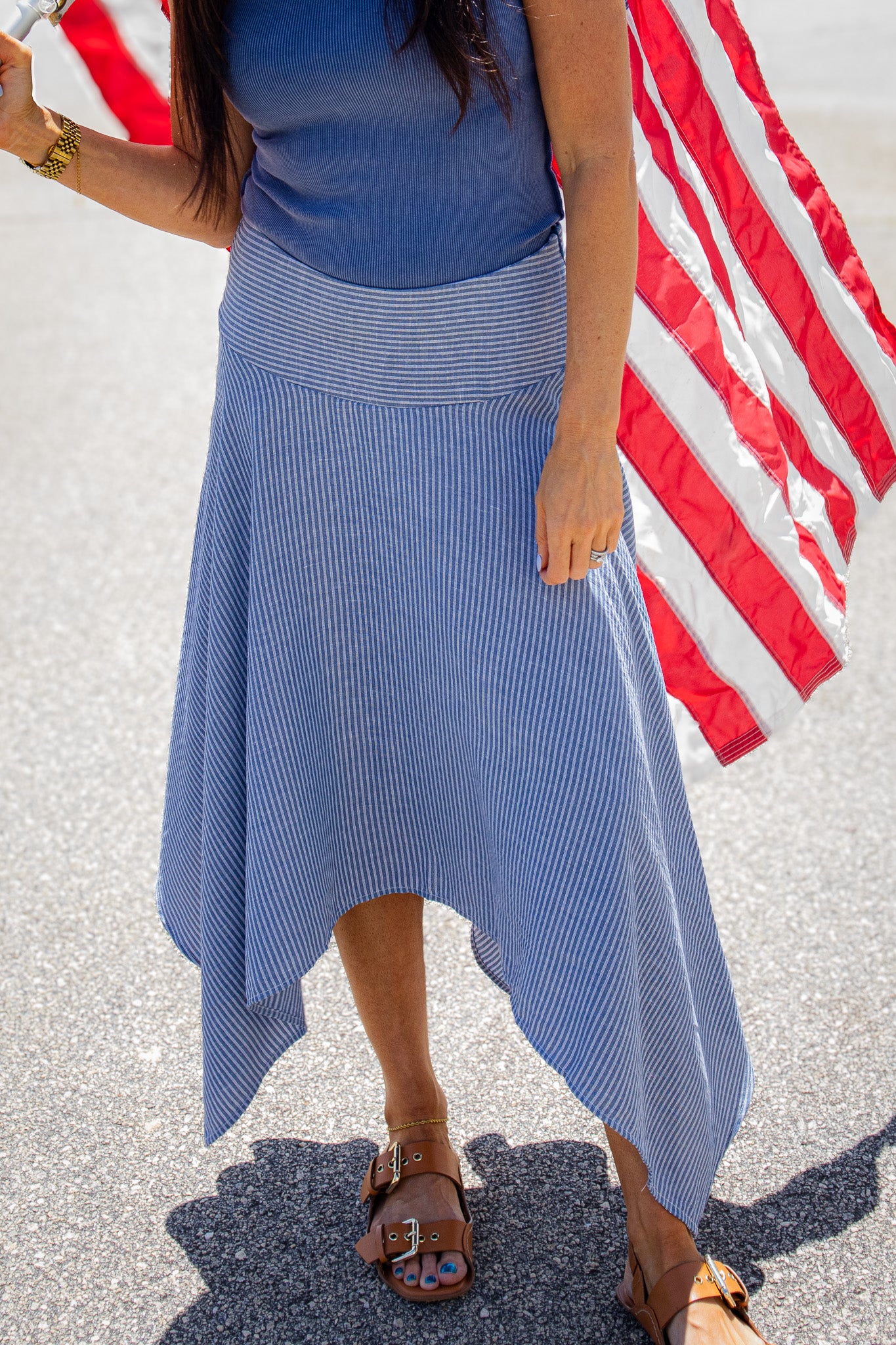Copy
Elevate your look with our Seaside Stripe Midi Skirt. Featuring a flattering handkerchief hem and sleek linen fit, it’s perfect for effortless coastal style.
