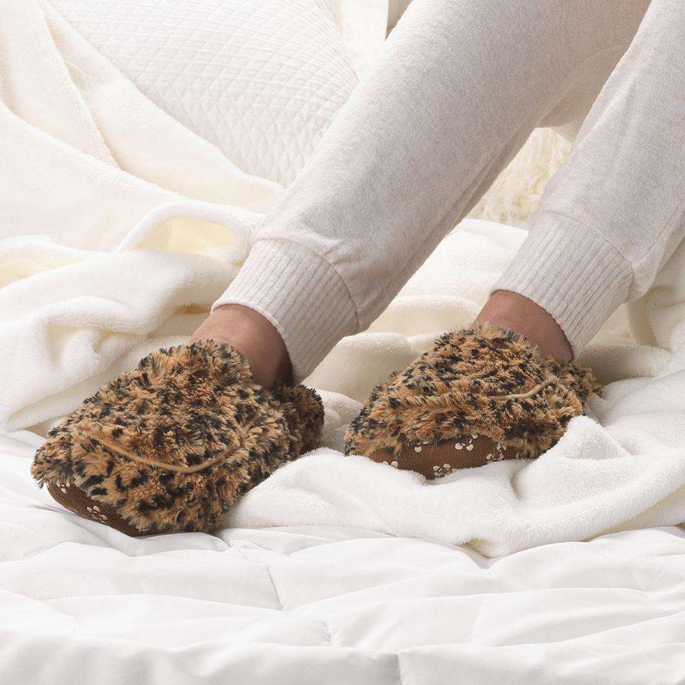 Warmies® plush slippers in leopard print, ultra-soft faux fur, and cozy closed-toe design, perfect for microwaveable warmth and everyday comfort.