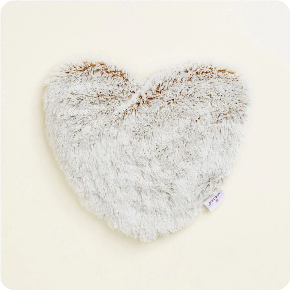 Warmies® heart-shaped plush heating pad infused with calming French lavender, designed to be heated or chilled for soothing comfort, muscle relief, and cozy relaxation.