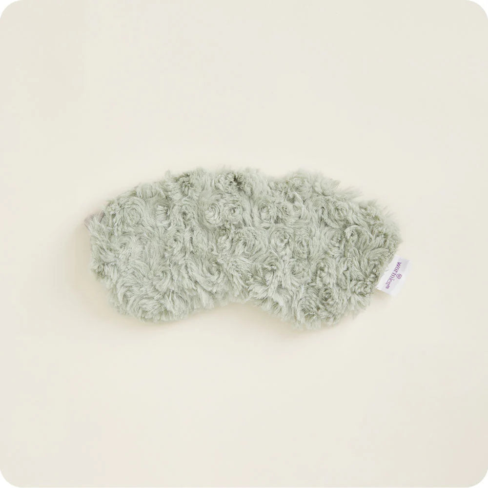 Warmies® plush eye mask infused with calming French lavender, designed to be heated or chilled for soothing relief from tired eyes, headaches, and everyday stress.