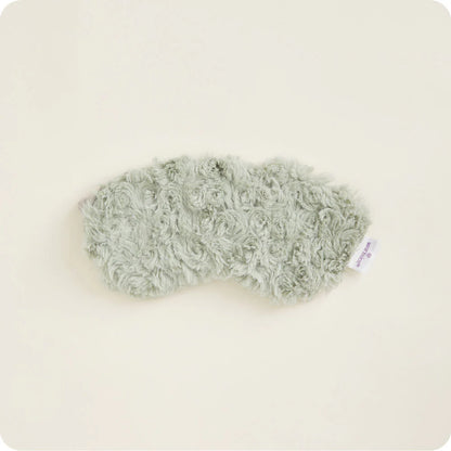 Warmies® plush eye mask infused with calming French lavender, designed to be heated or chilled for soothing relief from tired eyes, headaches, and everyday stress.