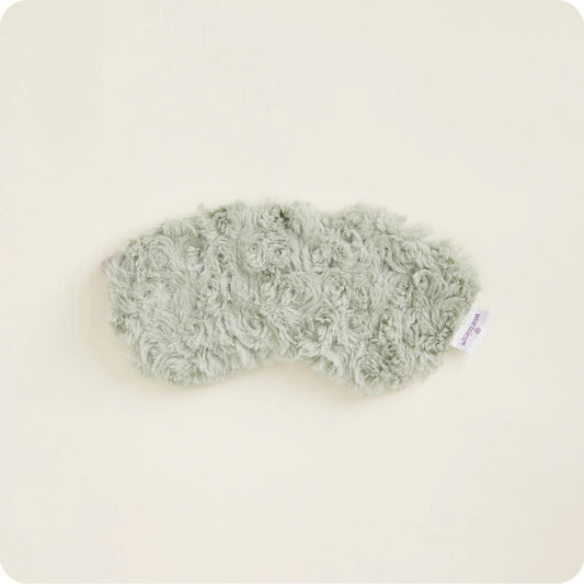 Warmies® plush eye mask infused with calming French lavender, designed to be heated or chilled for soothing relief from tired eyes, headaches, and everyday stress.