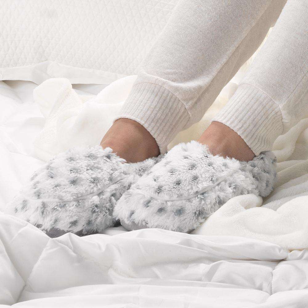 Warmies® plush slippers with gray polka dots, ultra-soft faux fur, and cozy closed-toe design, perfect for microwaveable warmth and everyday comfort.