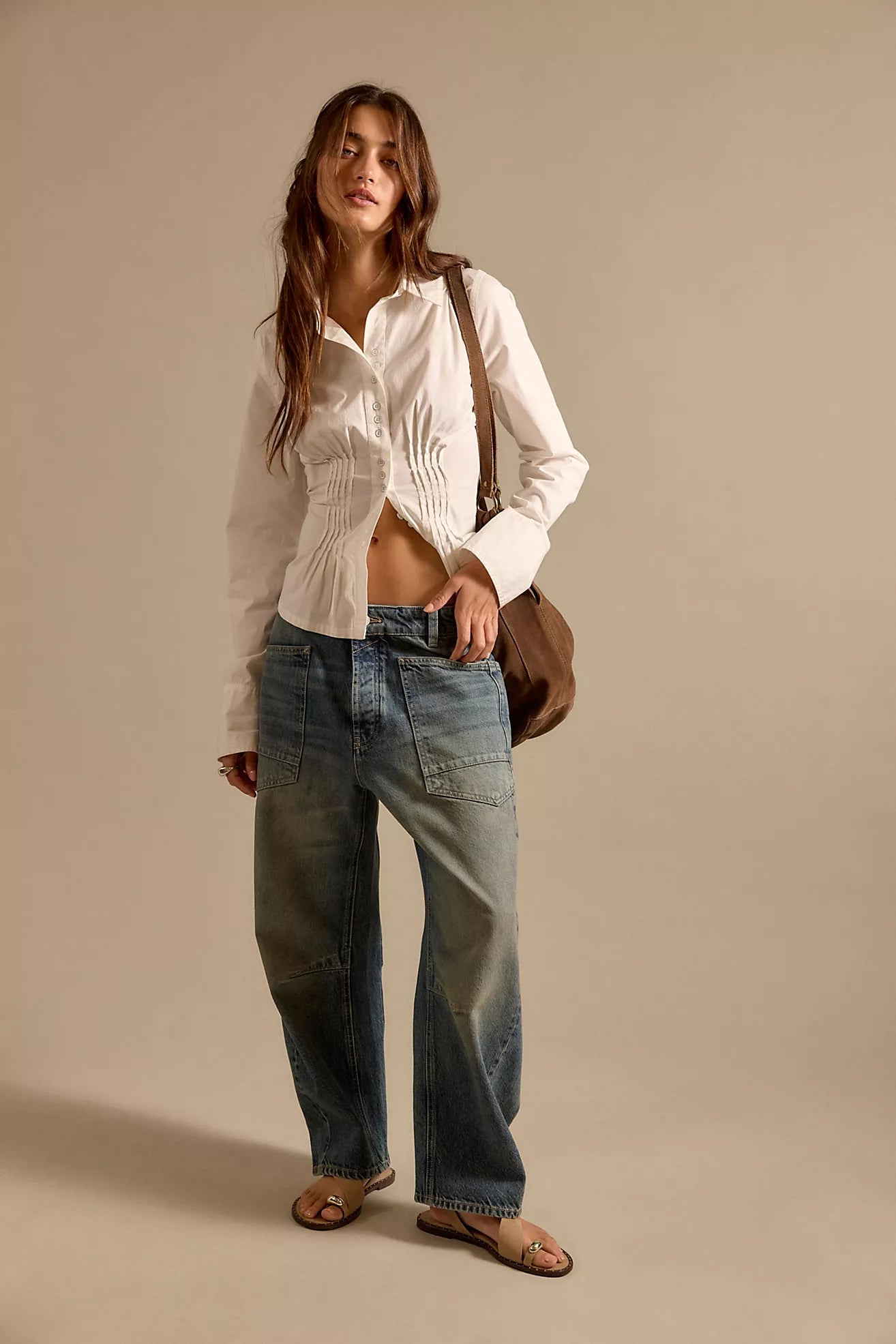 Shop the We The Free Minimalist Moxie Jeans. Featuring a low-slung barrel leg, rigid denim, and oversized pockets for an effortless, slouchy fit. Upgrade today!